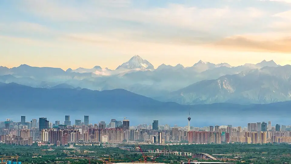 Chengdu — 雪山下的成都市天际线 Chengdu skyline with snow capped mountains